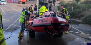 Two rescued after being stranded by rising tides