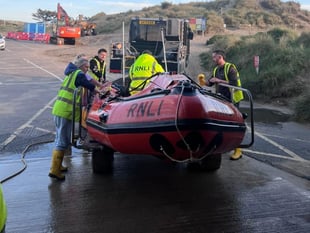Two rescued after being stranded by rising tides