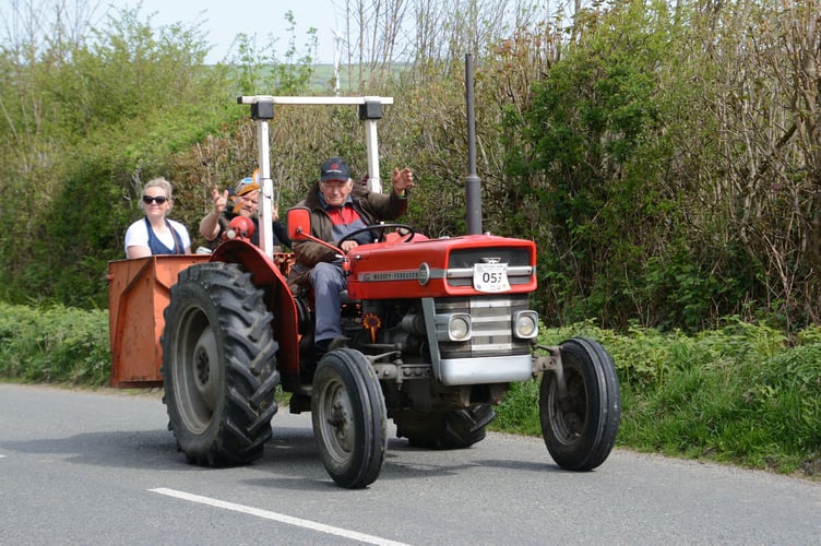A vintage tractor taking part in the Mali Dubois Memorial Tractor Run (Picture: Rodney Parrish)