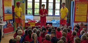 RNLI lifeguards provide pupils with water safety advice