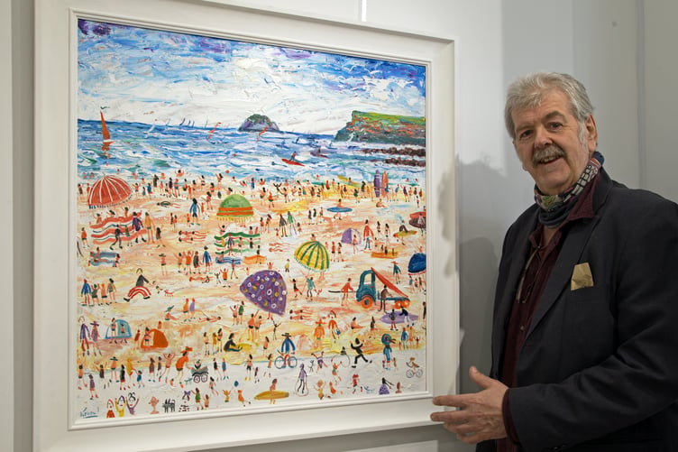 Artist Simeon Stafford with one of his paintings