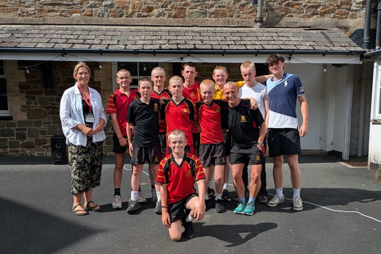 Ms Vetch and Shebbear College students after braving the shave (Picture: Shebbear College)
