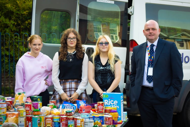 The three students pictured with Andrew Sweeney, the school's principal (Picture: Holsworthy Community College)