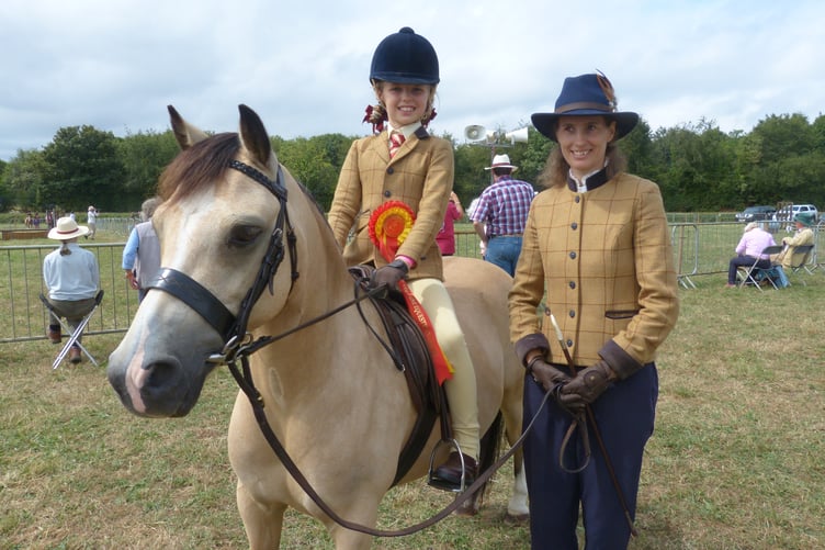 The dream team, nine-year-old Phoebe Lou with seven-year-old Manwee Prince Albert and his owner Helen Gill of Callington. They are no strangers to the horse section and were pleased to clinch a 1st in their group ahead of the championship. Experienced rider Phoebe said: "This is his first real season. He used to be scared of the rain but he is much better now." The whole family were getting involved this year, as Phoebe's mother Chloe Taylor-Baker said: "Her sister Daisy is getting ready to go into the main ring now for the rugby display. We normally just do the horses but seem to have got involved with more this year. It has been a day of first though, everyone seems to be doing really, really well."