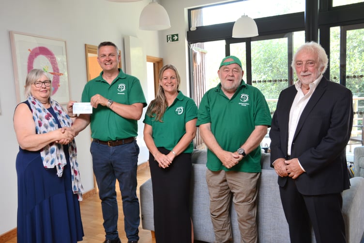 Representatives from Holsworthy League of Friends presenting the cheque to BASICS Devon (Picture: Rodney Parrish)