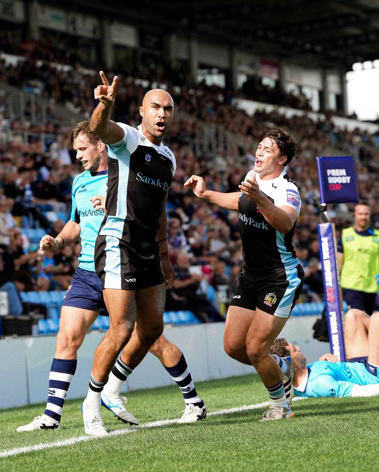 Exeter Chiefs winger Olly Woodburn celebrates the second of his two tries in his side's PREM Rugby Cup win over Bristol Bears