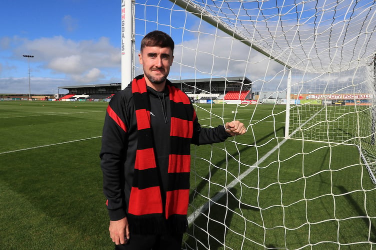 Will Dean of Truro City signs a new contract before the Emirates FA Cup Third Qualifying Round match between Truro City and Cirencester Town at Truro City Stadium, Truro on 3 October 2026 (Photo: Dave Rowntree/PPAUK)