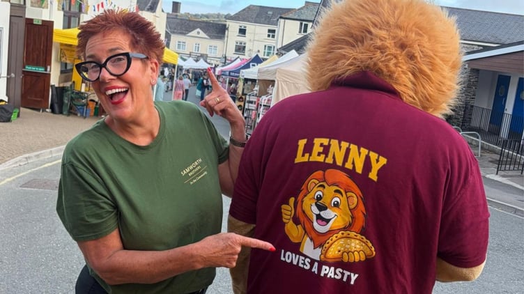 Sarah Perkins from Samworth Brothers is all smiles with Lenny the Lion at the Callington Honey Fair
