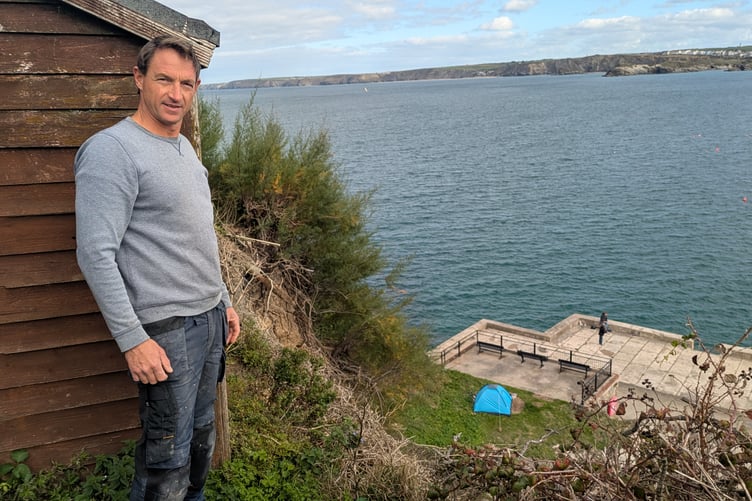 Christopher Bennetts surveying the bottom of his garden which was lost when the cliff collapsed in January (Picture: Warren Wilkins)