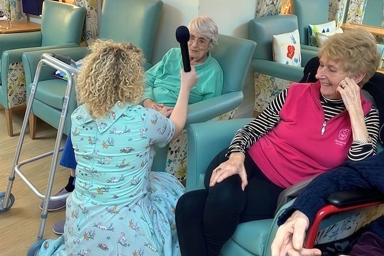 Residents enjoying the entertainment on offer at Deer Park Nursing Home (Picture: Camelot Care)