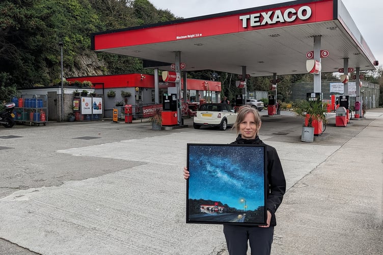 Diane with her painting at the Texaco Filling Station