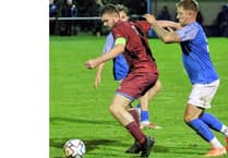 Robinson's brace gives Clarets dogged home win