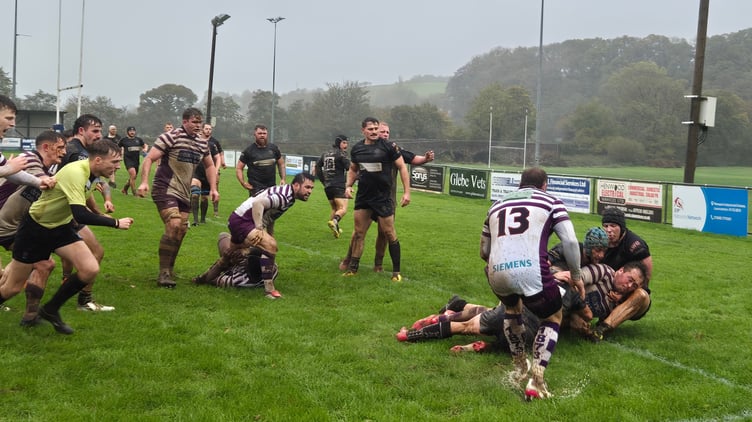 Launceston's defence look to prevent a try.