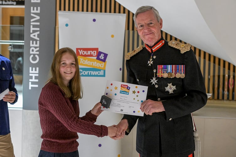 Alana Menmuir, a passionate young writer from Truro who has been inspired by the power of storytelling and hopes to create stories that spark imagination, connection and optimism for the future. She was presented her certificate by the Lord Lieutenant